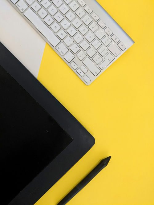 gray-apple-wireless-keyboard-beside-black-tablet-computer-and-stylus-pen-muOHbrFGEQY.jpg