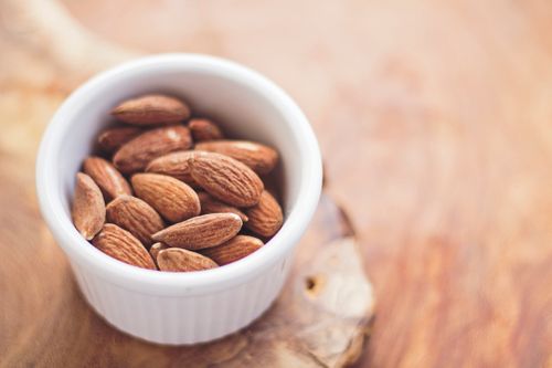 shallow-focus-photography-of-almonds-in-white-ceramic-bowl-TTrJMhrkoeY.jpg