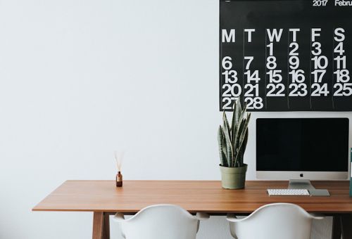 silver-imac-on-brown-wooden-desk-PypjzKTUqLo.jpg