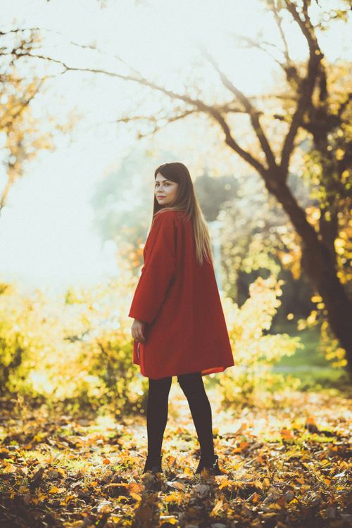 selective-focus-photography-of-woman-standing-at-dried-leaf-filled-ground-under-ray-of-sun-CMqe7Xf8bb8.jpg